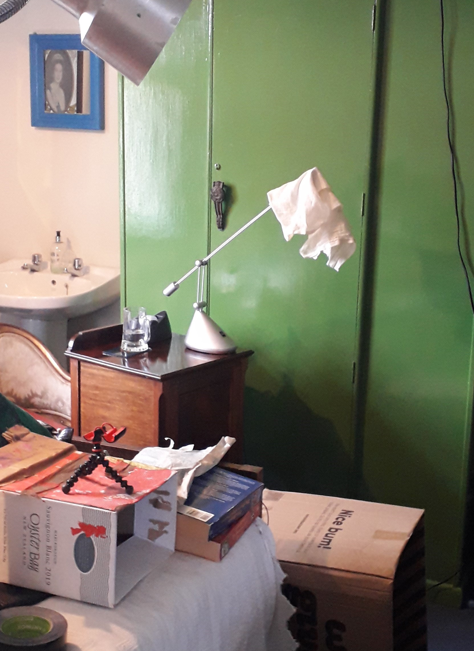 A photo of Marion’s makeshift set at home using household objects.